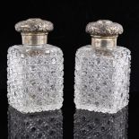 A pair of Victorian silver-mounted cut-glass hobnail dressing table scent bottle jars, relief