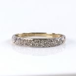 A modern 9ct gold diamond cluster half eternity ring, total diamond content approx 0.2ct, setting