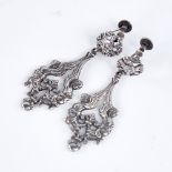 A pair of 19th century Continental silver drop earrings, pierced foliate decoration with double-