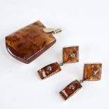 A Vintage amber demi-parure, comprising unmarked gold-mounted pendant and pair of unmarked gold-