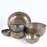 A group of various Eastern unmarked white metal bowls and trays, largest diameter 14cm, 9.4oz