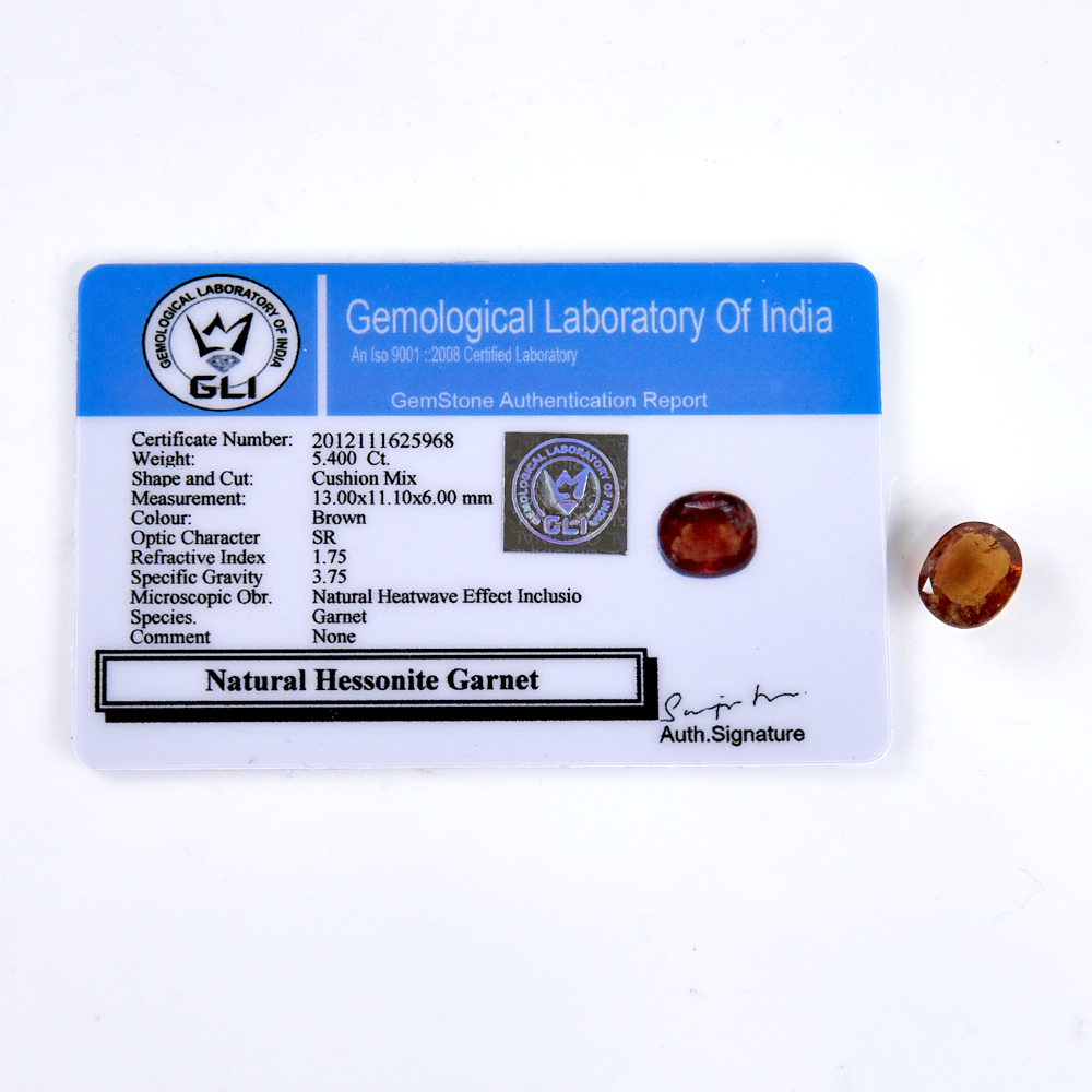 A 5.40ct unmounted oval mixed-cut hessonite garnet, dimensions: 13.00mm x 11.10mm x 6.00mm, 1.08g, - Image 4 of 5