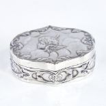 A late Victorian Art Nouveau silver dressing table box and cover, oval form with relief embossed