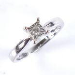 A modern 9ct white gold 0.05ct solitaire diamond ring, set with round brilliant-cut diamond within
