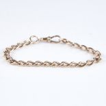 An early 20th century 9ct gold curb link bracelet, with dog clip, bracelet length 21cm, 14.5g Good