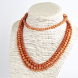 2 19th century graduated coral bead necklaces, necklace lengths 132cm and 40cm, 82.8g total, longest