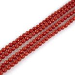 2 single strands of polished coral beads, bead diameter approx 4.7mm, strand lengths 40cm, 29.7g