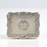 A Victorian silver vinaigrette, scalloped rectangular form with engine turned and engrave foliate