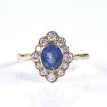 A late 20th century 18ct gold sapphire and diamond lozenge panel ring, set with oval mixed-cut