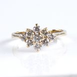 A late 20th century 9ct gold diamond cluster ring, set with round brilliant-cut diamonds, total