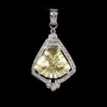 A modern unmarked silver citrine diamond and ruby pendant, set with 15ct fantasy-cut citrine rose-