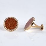 A modern pair of 18ct rose gold gold stone and diamond cluster panel cufflinks, total diamond