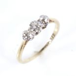 An early 20th century 18ct gold 3-stone diamond ring, set with round brilliant and old-cut diamonds,