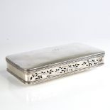 A George IV rectangular silver pot pourri box, reeded edge of lid with pierced floral long side