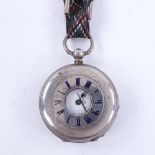 A late 19th/early 20th century Swiss silver half hunter key-wind pocket watch, white enamel dial
