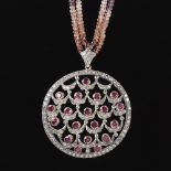 A Belle Epoque unmarked gold and silver amethyst and diamond cluster pendant necklace, set with