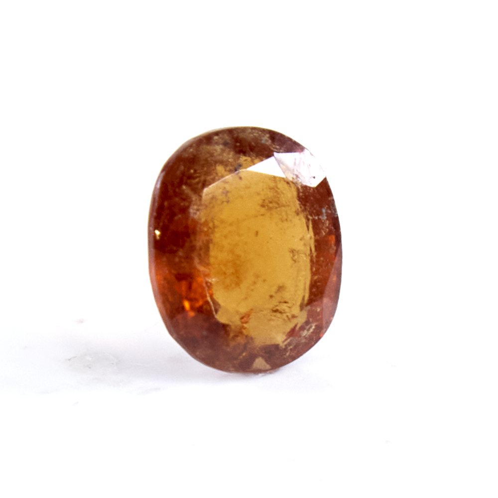 A 5.40ct unmounted oval mixed-cut hessonite garnet, dimensions: 13.00mm x 11.10mm x 6.00mm, 1.08g, - Image 2 of 5