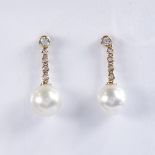 A modern pair of 14ct gold whole cultured Akoya pearl and diamond drop earrings, total diamond