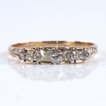 An early 20th century 18ct gold graduated 5-stone diamond half hoop ring, total diamond content