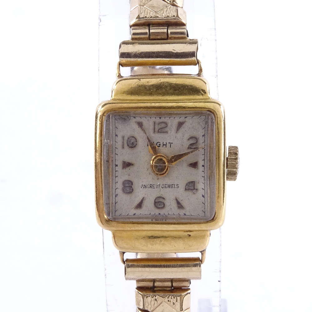 LIGHT - a lady's Vintage 18ct gold mechanical wristwatch, silvered dial with gilt eighthly Arabic