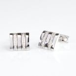 A pair of 18ct white gold diamond cufflinks, each rectangular panel set with a double-row of round