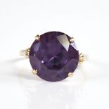 A late 20th century 18ct gold synthetic sapphire dress ring, sapphire diameter 14.6mm, size S, 6g