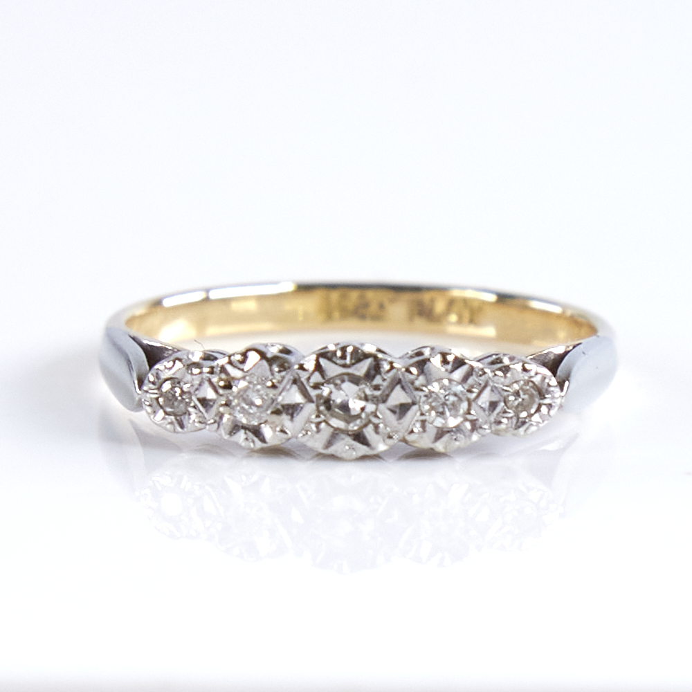 A late 20th century 18ct gold graduated 5-stone diamond half hoop ring, in illusion style setting,