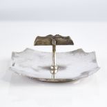 A Victorian silver desk cigar stand, canted square form with central raised stand, indistinct