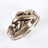 A modern 9ct gold puzzle knot ring, formed as 4 separate bands intertwined, setting height 10.8mm,