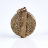 A small 19th century unmarked yellow metal travelling swivel photo locket pendant, allover