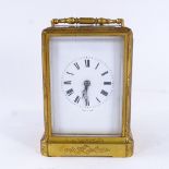 A 19th century French brass 8-day striking carriage clock, by Jules of Paris, white enamel dial with