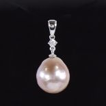 A modern 14ct white gold whole pink South Sea pearl and diamond drop pendant, round brilliant-cut