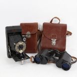 A leather-cased Kodak Ensign folding camera, and a leather-cased pair of German Noctovist 8x30
