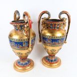 A modern pair of Egyptian Revival gilded and painted urn vases, height 41cm