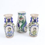 A group of Middle Eastern Iznik earthenware pottery, comprising mug and pair of vases, largest
