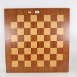 A Spanish inlaid specimen wood chess board, 59.5cm x 59.5cm