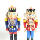 2 carved and painted wood nutcracker figures, largest height 34cm (2)