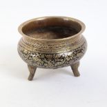 A Chinese bronze and black enamel censer, rim diameter 14cm, height 11cm