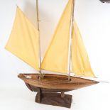 Clive Fredriksson, handmade model sailing pond yacht, with cloth sails and string rigging, on