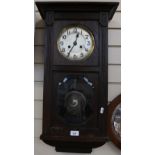 A Vintage oak-cased 8-day drop dial wall clock, silvered dial with Arabic numerals, case height