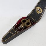 An early 20th century leather-cased set of sewing scissors, by Joseph Rodgers & Sons of Sheffield,