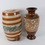 A Fulham Pottery glazed barrel with printed frieze, 29cm, and a Doulton Slaters baluster vase
