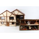 A handmade model doll's house diorama, with many fixtures and fittings, H42cm, W47cm