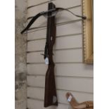 A mahogany steel and aluminium crossbow, overall length 78cm