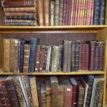 A shelf of leather-bound books, including 3 volumes Histoire De L'Art, 3 volumes Rivers of Great