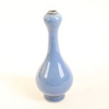 A small Chinese light blue glaze garlic-neck vase, with 6 character Qianlong mark in Kaishu