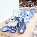 A collection of Wedgwood blue Jasperware items, including vases and boxes, tallest 13.5cm