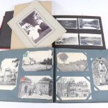 2 albums containing carte postales, postcards and photographs