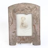 A late 19th/early 20th century Japanese silver plate on copper dragon photo frame, height 20cm,