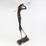 A composition stylised figure of a golfer on plinth, height 67cm overall